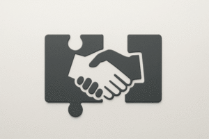 אייקון של לחיצת יד שהופכת לשני חלקי פאזל כסמל לחלוקת עסק בגירושין גירושין ופירוק שיתוף בעסק